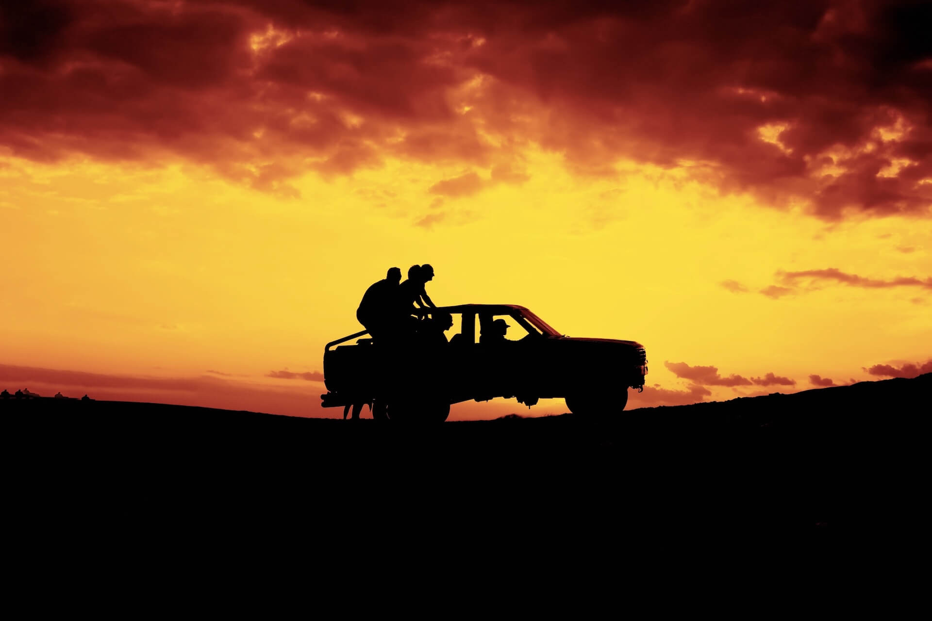 People taking a 4WD off road | Featured image of the Four Wheel Drive Off Road Vehicles Blog by Bus 4x4 Group.