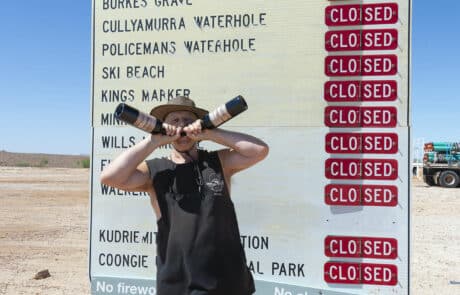 Robert holding bottles of Shiraz